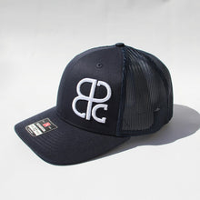 Load image into Gallery viewer, Peticolas Side Logo Trucker Hat